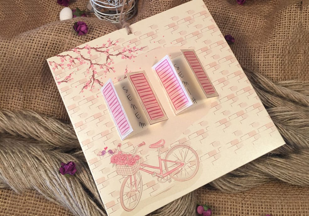 Invitatii nunta cu snur model floral si bicicleta 16.2 x 16.2 cm Invitatii nunta cu snur model floral si bicicleta 16.2 x 16.2 cm
