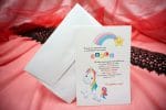 Invitatii botez cu unicorn si curcubeu 13.5 x 20 cm